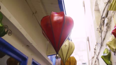 Red-Lantern-Hanging-in-Alleyway