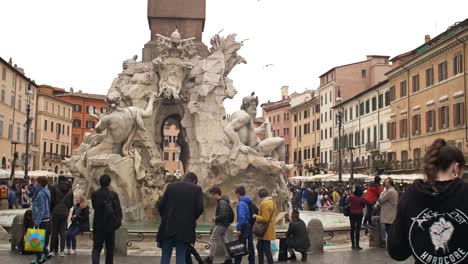 People-Walking-Around-Piazza-Navona-Fountain