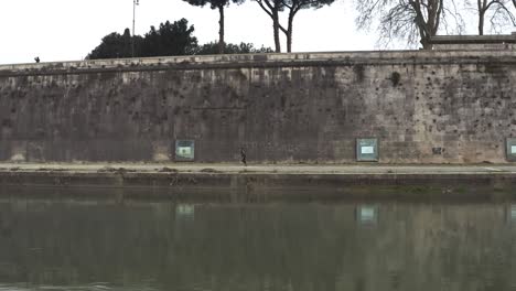 A-Person-Running-Along-The-Tiber-River