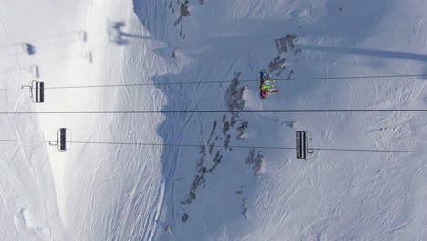 Skiers-on-a-Sk-Lift-from-Above