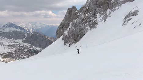 Following-Skier-Down-Mountainside
