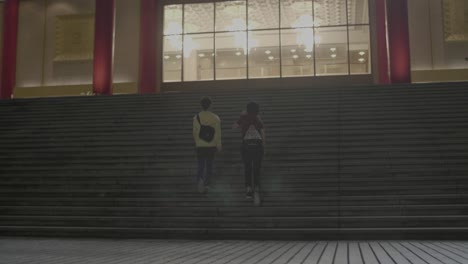 Women-Walking-Up-Staircase-Taipei-
