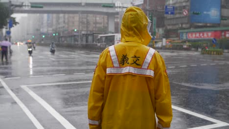 Traffic-Officer-in-Heavy-Rain-in-Taipei