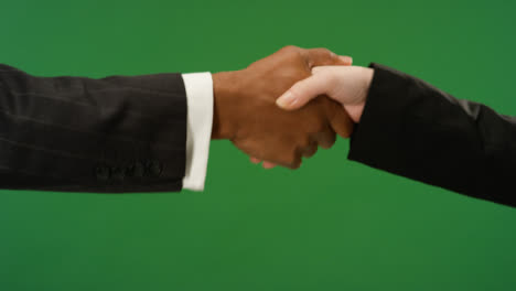 CU-Two-people-in-suits-shaking-hands-on-green-screen