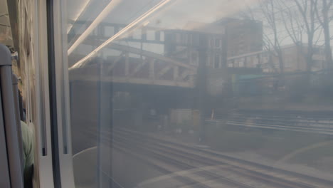 Looking-out-train-window-with-passing-train