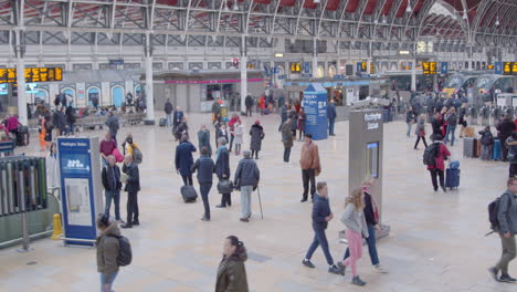 Commuters-walk-through-a-busy-Paddington-Station