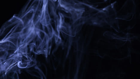Wispy-Blue-Smoke-Particles-in-Slow-Motion