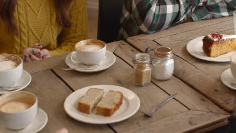 Cafe-Table-with-Coffee-and-Cakes