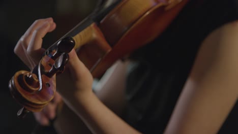 Close-Up-Of-A-Female-Violinist-During-A-Performance