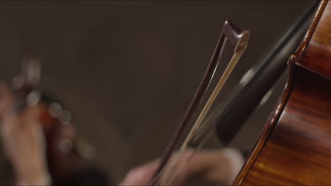 Extreme-Close-Up-Of-Bow-On-Cello-Strings