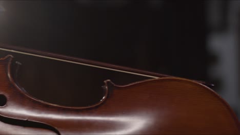 Panning-Shot-of-Cello-With-Bow