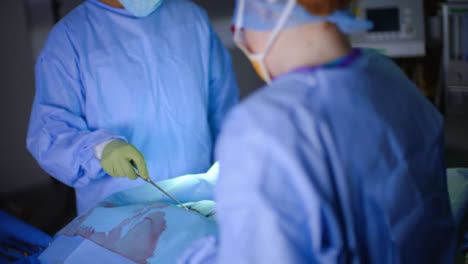 Two-Surgeons-Operating-on-Patient-in-Surgery