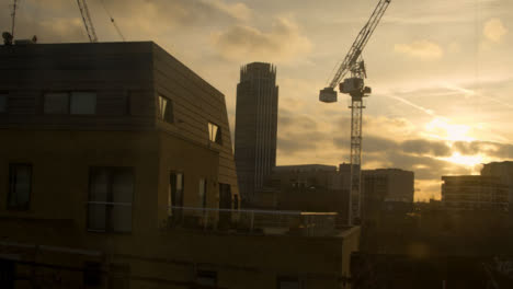 Crane-in-London-Skyline-From-A-Moving-Train