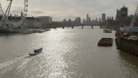 Boat-on-the-The-River-Thames-With-London-Cityscape