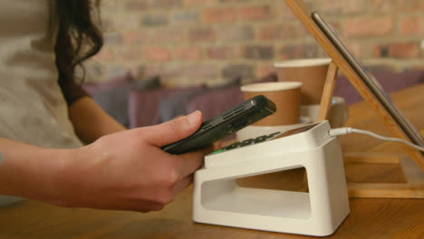 Close-Up-of-Contactless-Phone-Payment-01