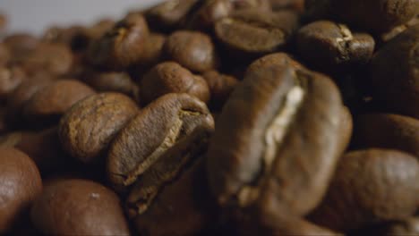Macro-Shot-of-Coffee-Beans-Moving-Past-Camera