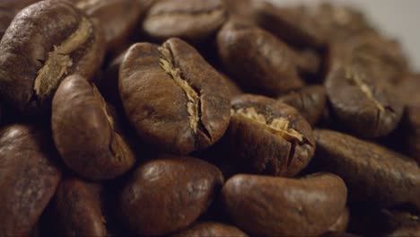 Close-Up-of-Coffee-Beans-Moving-Past-Camera