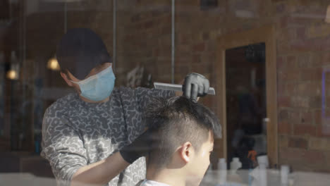 Barber-Cuts-Hair-Wearing-Face-Mask