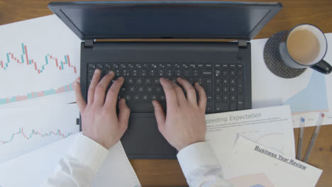 Male-Hands-Slowly-Typing-on-Laptop