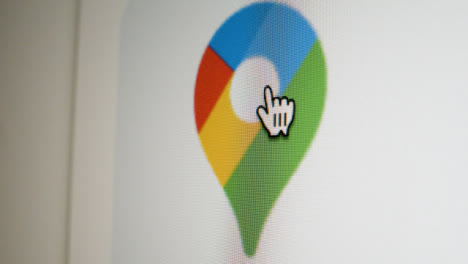 Close-Up-Pan-Clicking-on-Google-Maps-Icon-on-Screen