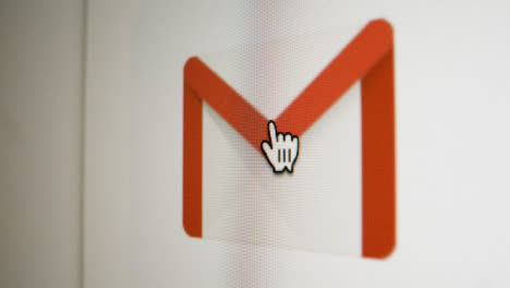 Close-Up-Pan-Clicking-on-Google-Gmail-Icon-on-Screen