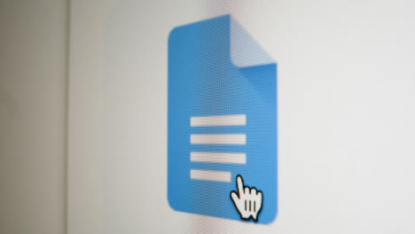 Close-Up-Pan-Clicking-on-Google-Docs-Icon-on-Screen