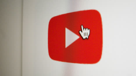 Close-Up-Pan-Clicking-on-Google-Youtube-Icon-on-Screen
