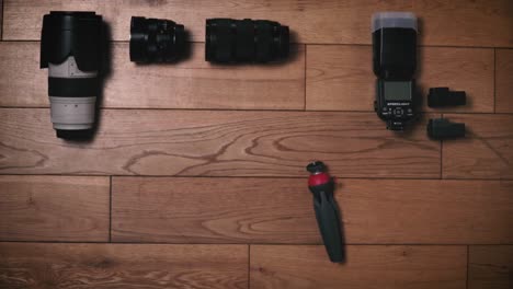 Flat-Lay-Stop-Motion-Clip-Camera-Gear-Sliding-Out-of-Frame