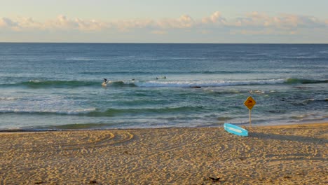 Surfers-in-the-water-at-Empty-Beach