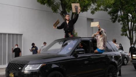 Hollywood-Protesters-Shouting-From-Car-During-Protester