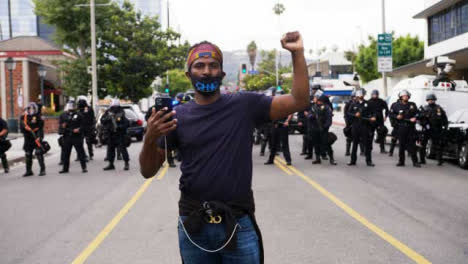 Hollywood-Portrait-of-Protester-in-Front-of-Police