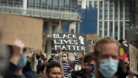 Protestor-Holds-Up-BLM-Sign-During-London-Protests
