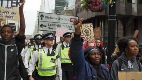 London-Protesters-Chant-Beside-Police-Officers