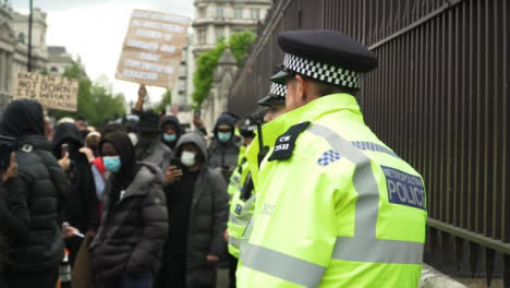 London-Angry-Protester-Shouting-at-Police-Officers