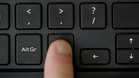 Top-View-Finger-Pressing-Ctrl-Keyboard-Button