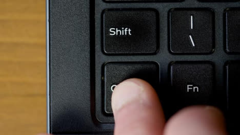 Top-View-Finger-Pushing-Ctrl-Keyboard-Button