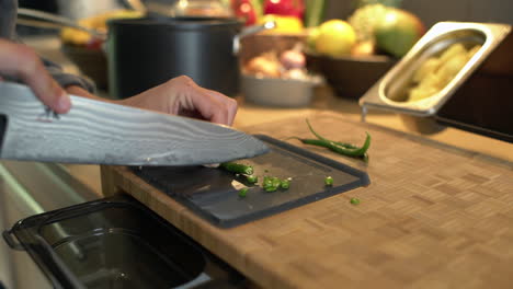 Close-Up-of-Female-Hands-Slicing-a-Green-Bean