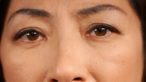 Middle-Aged-Woman-Stares-Directly-into-Camera-Portrait