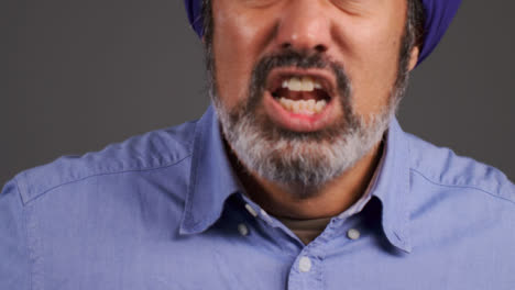 Middle-Aged-Man-In-Turban-Shouting-Portrait