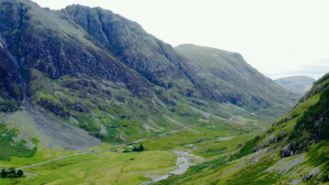 Aerial-Drone-Shot-of-Road-Through-the-Glen-Coe-Hills-03