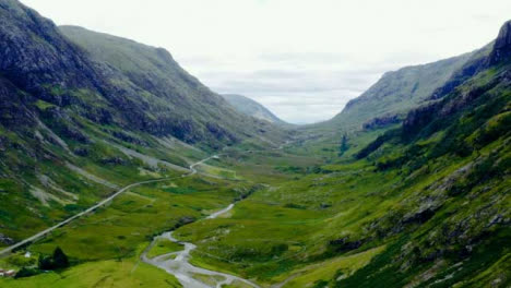 Aerial-Drone-Shot-of-Road-Through-the-Glen-Coe-Hills-04