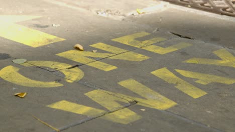 Close-Up-of-One-Way-Pavement-Marking-In-Oxford-England