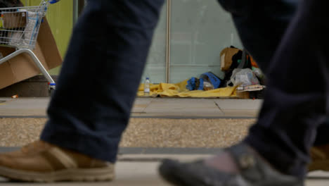 Long-Shot-of-Homeless-Persons-Belongings-In-Doorway-In-Oxford-01