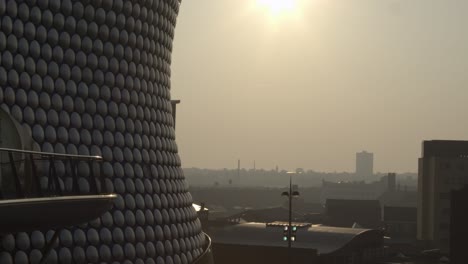Pan-Reveal-of-Cityscape-with-Selfridges-Building-in-Morning