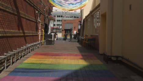 Tracking-Shot-of-Pride-Artwork-Painted-on-Ground-In-Birmingham