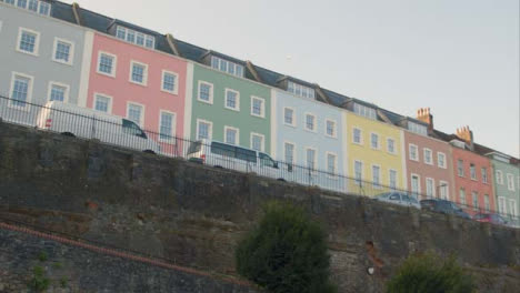 Low-Angle-Tracking-Shot-of-Colourful-Town-Houses-In-Bristol-England-