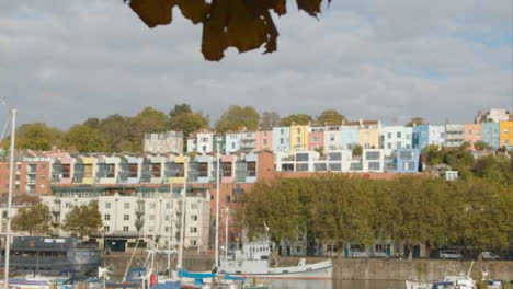Tracking-Shot-Revealing-Colourful-Waterside-Town-Houses-In-Bristol-England