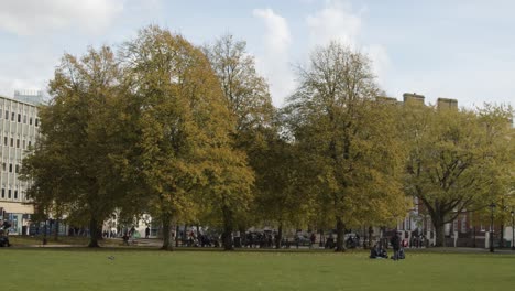 Sliding-Shot-of-People-On-College-Green-In-Bristol-England