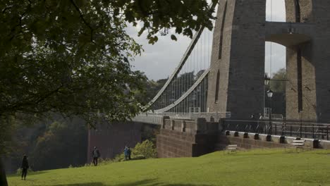Sliding-Shot-From-Behind-Tree-Revealing-Clifton-Suspension-Bridge-In-Bristol-England