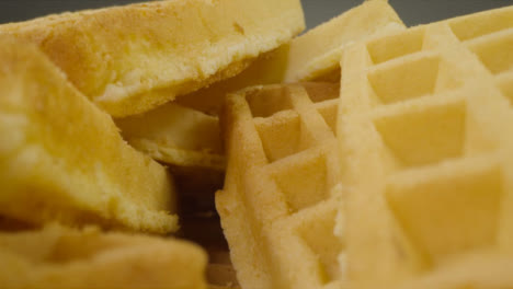 Sliding-Extreme-Close-Up-Shot-of-Pile-of-Waffles-